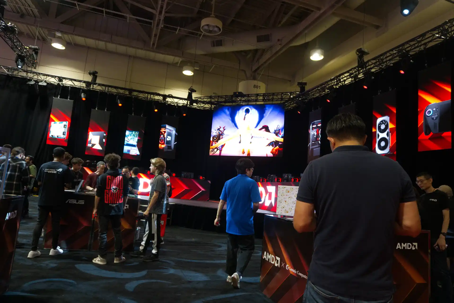 AMD PC Free Play gaming area setup at FAN EXPO Canada 2026 where attendees could sit down and play