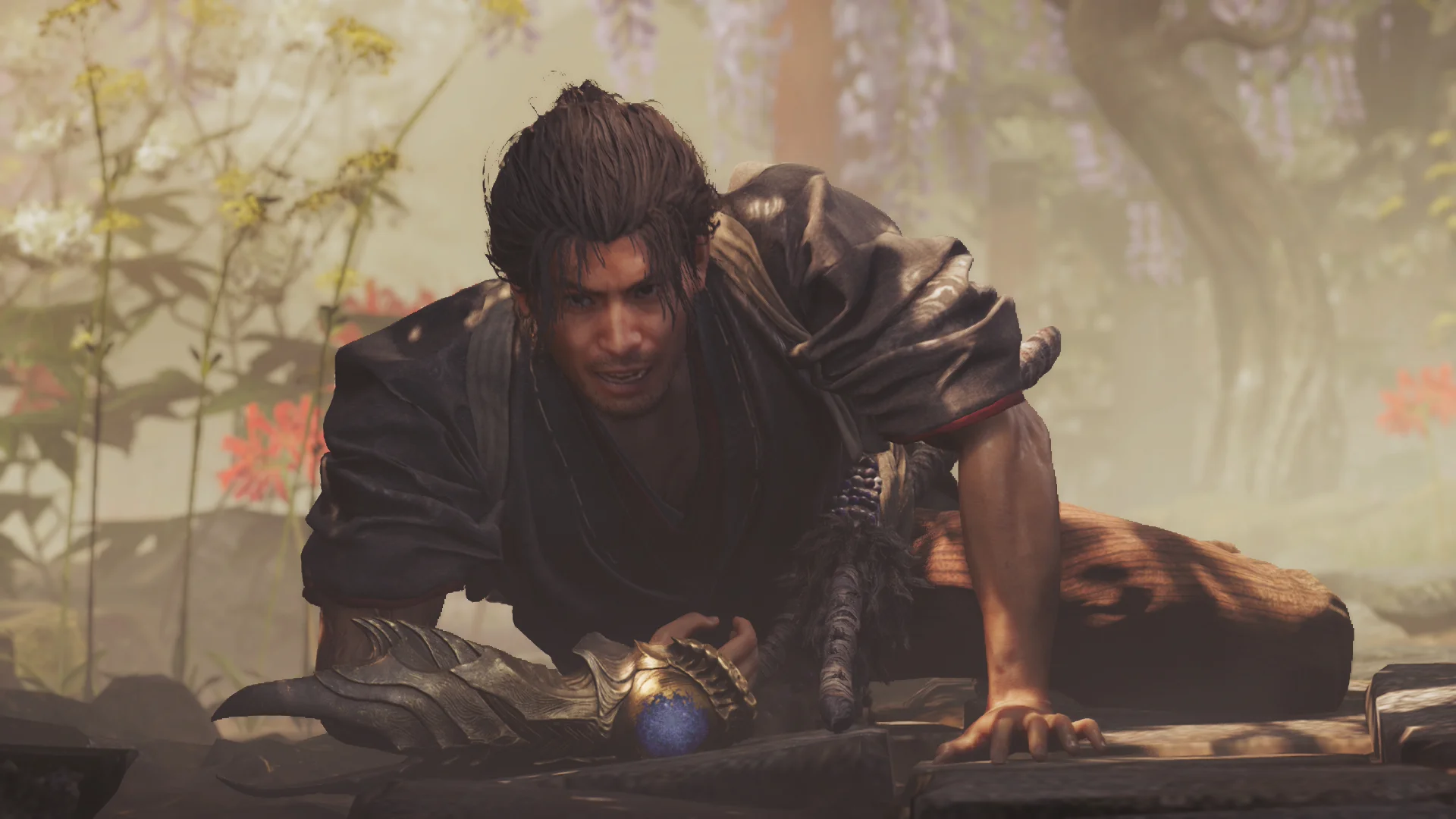 Musashi kneels in a misty forest of red spider lilies, his ornate Oni Gauntlet with its glowing blue stone extended before him